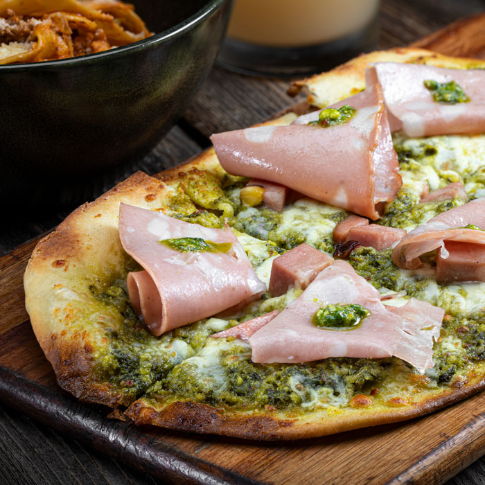 carson kitchen flatbread pistachio pesto and mortadella credit chris wessling