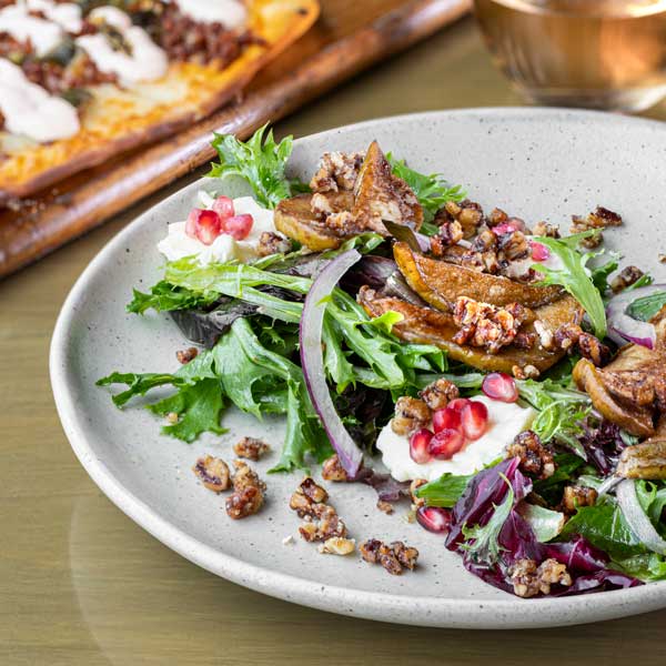 carson kitchen giner pear salad pecan brie ginger honey vin credit chris wessling